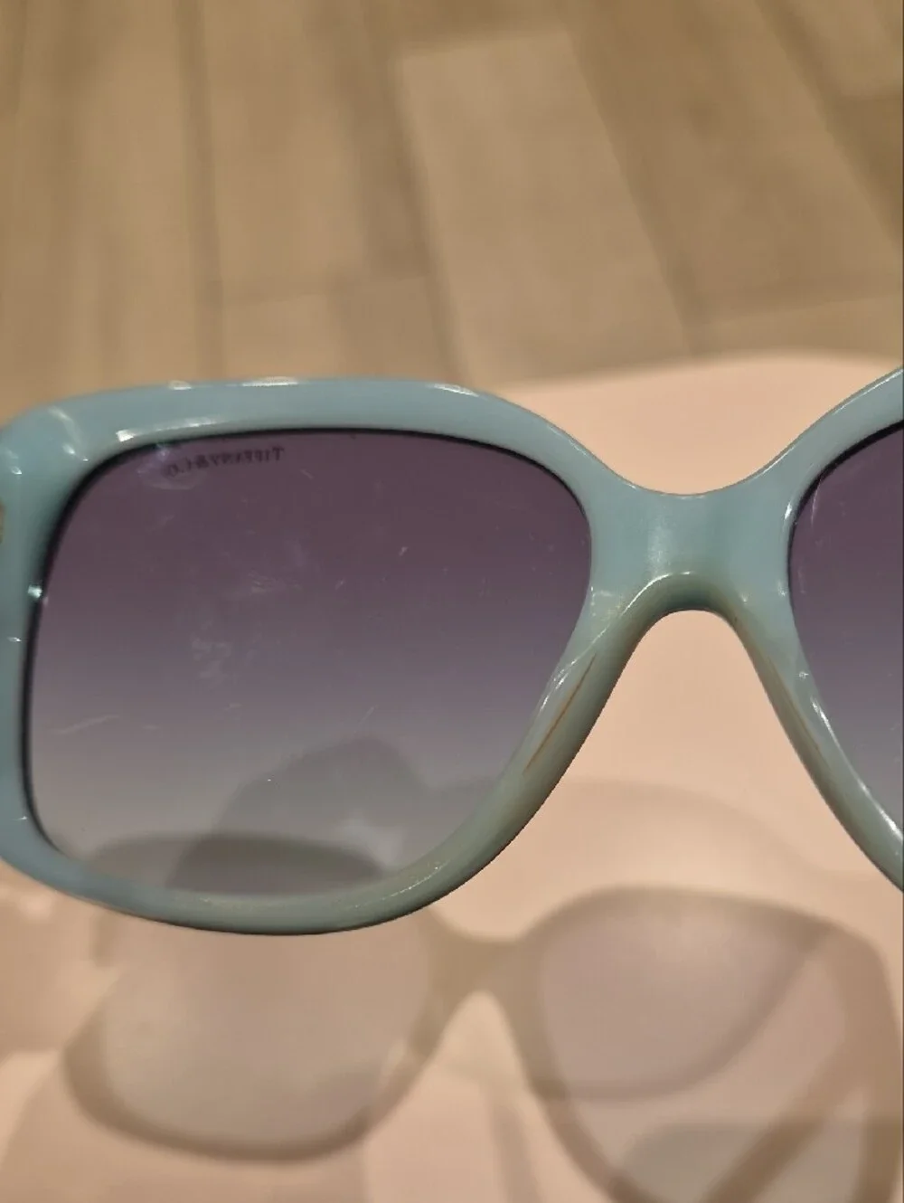 Tiffany & Co. Black Cat-Eye Sunglasses with Purple-Tinted Lenses